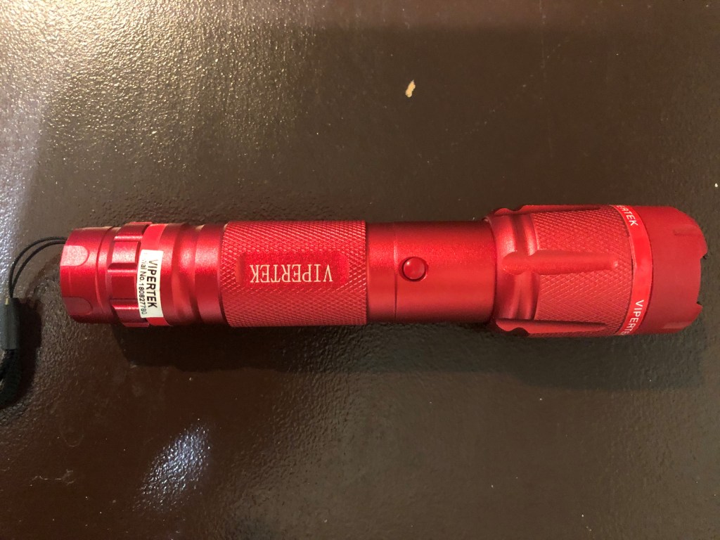 a red taser which looks like just a regular flashlight